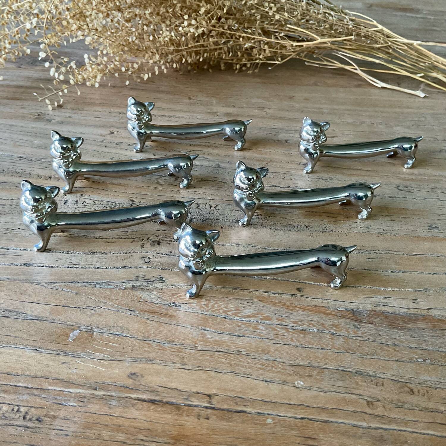 6 silver metal “cat” knife holders
