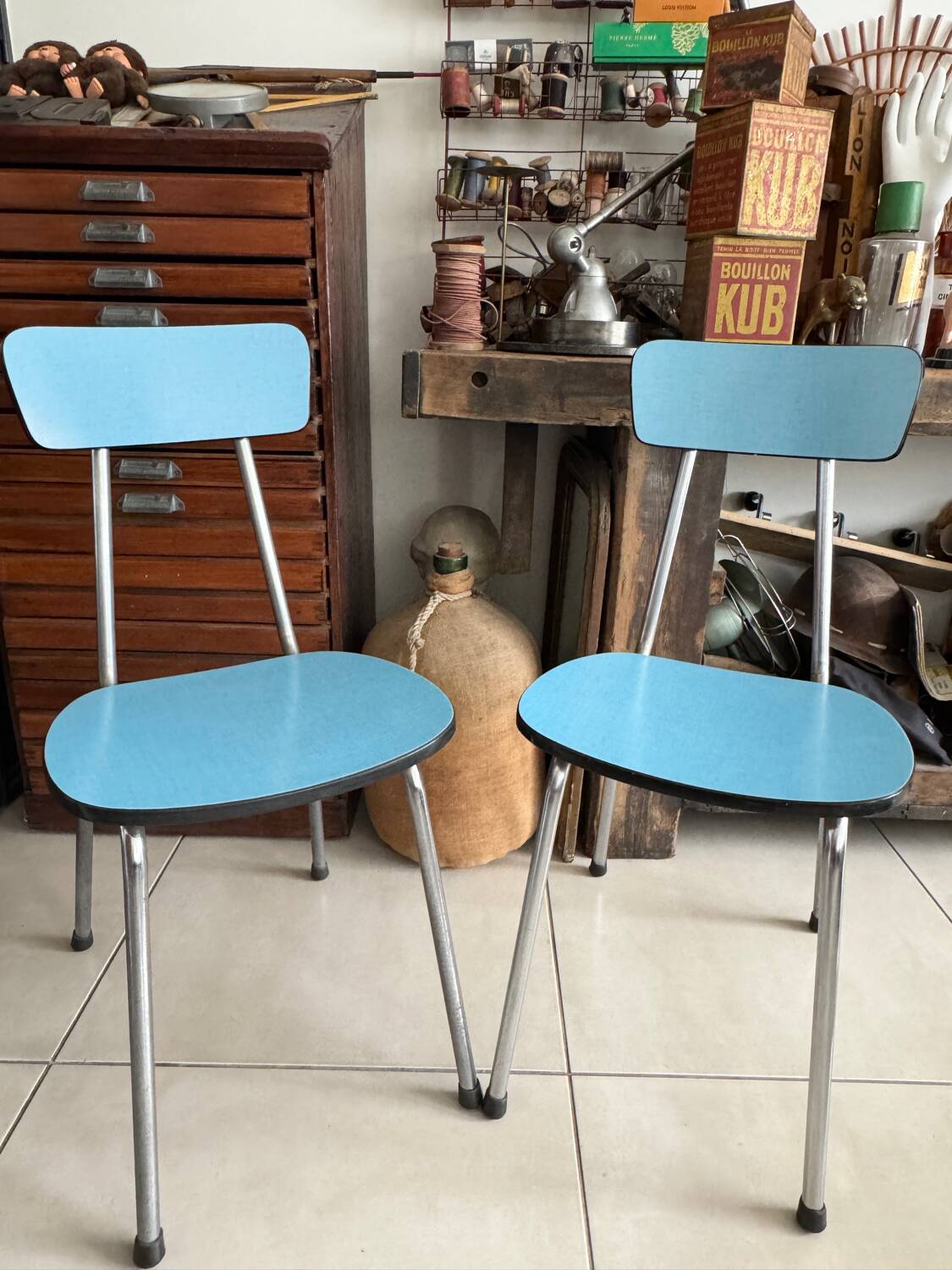 Pair of vintage blue Formica chairs