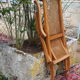 Fauteuil pliant canné en bois massif