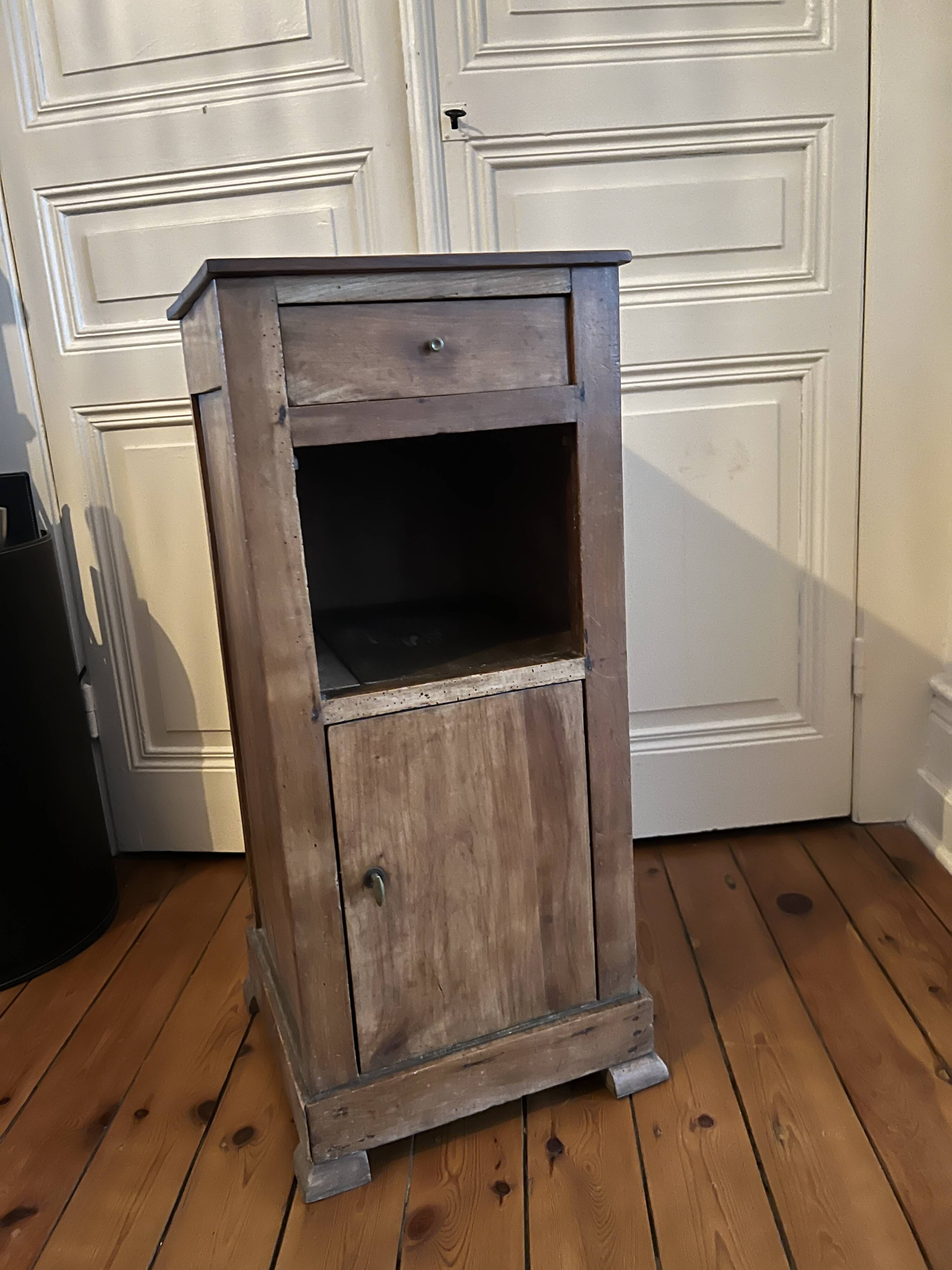 Old wooden bedside table