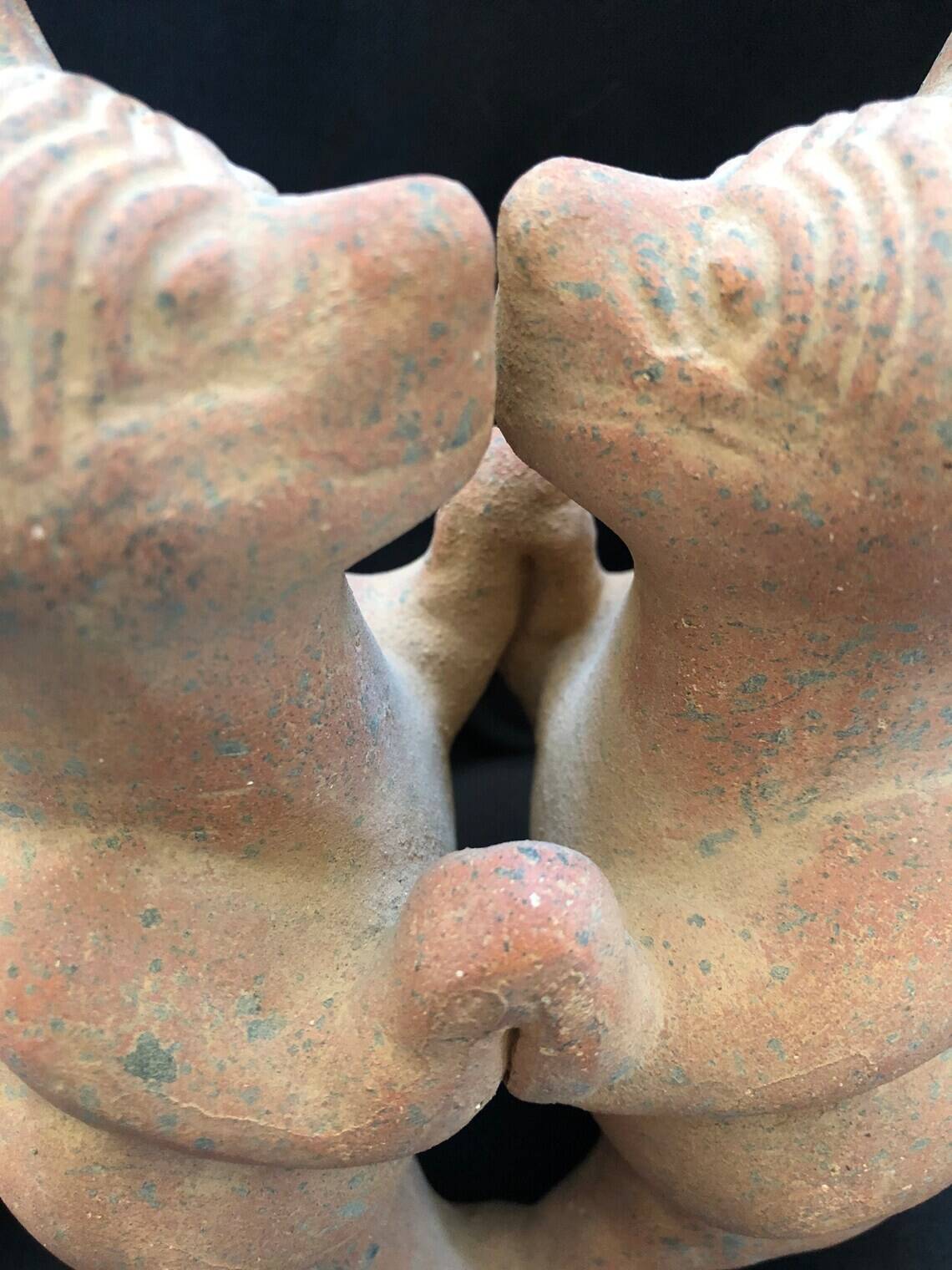 Pre-columbian style terracotta sculpture dancing fat dogs from colima mexico culture