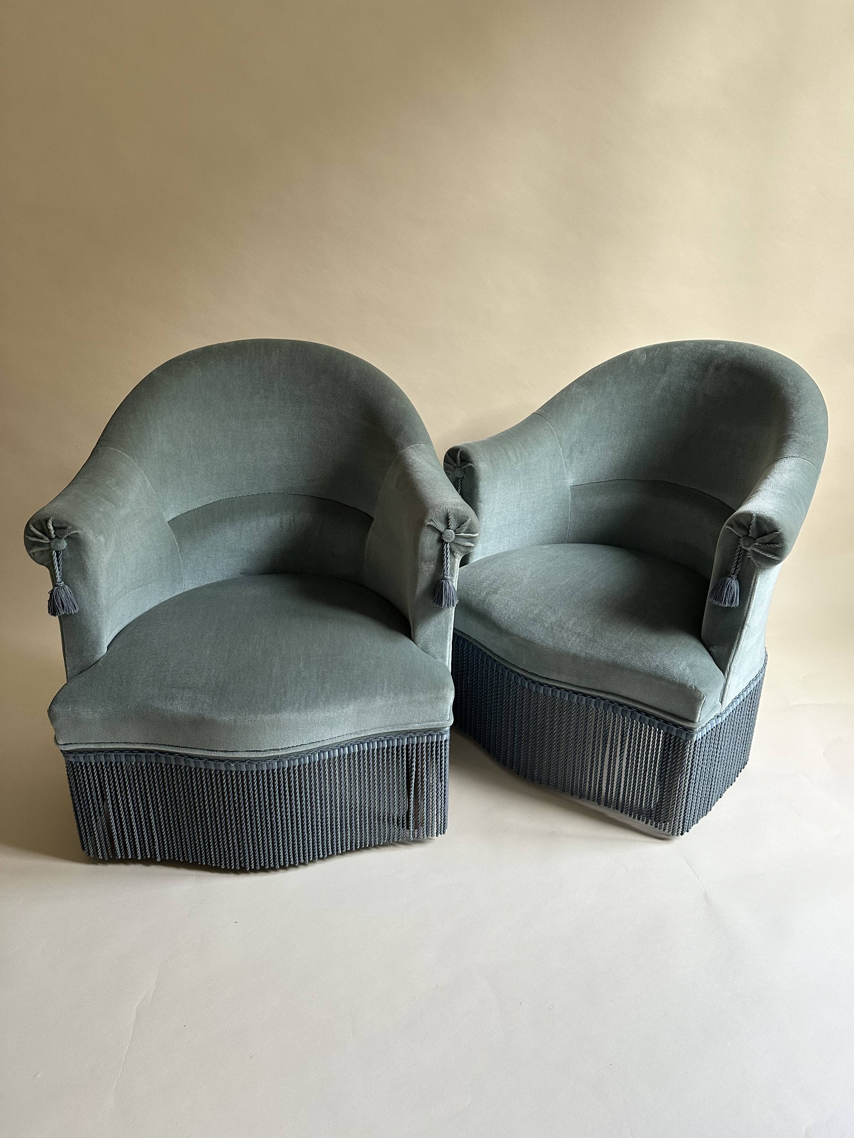 Blue velvet frog armchairs