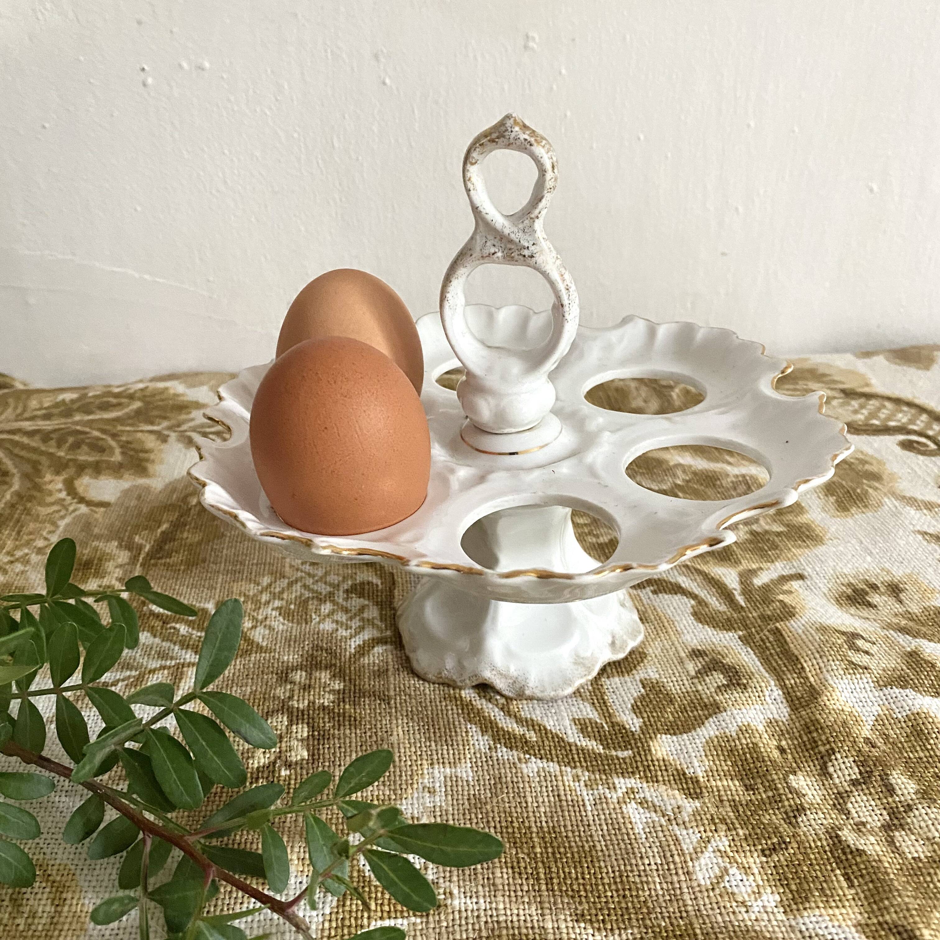 Early 20th century porcelain egg display