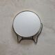 Small magnifying mirror