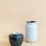 Duo of small black and white ceramic vases