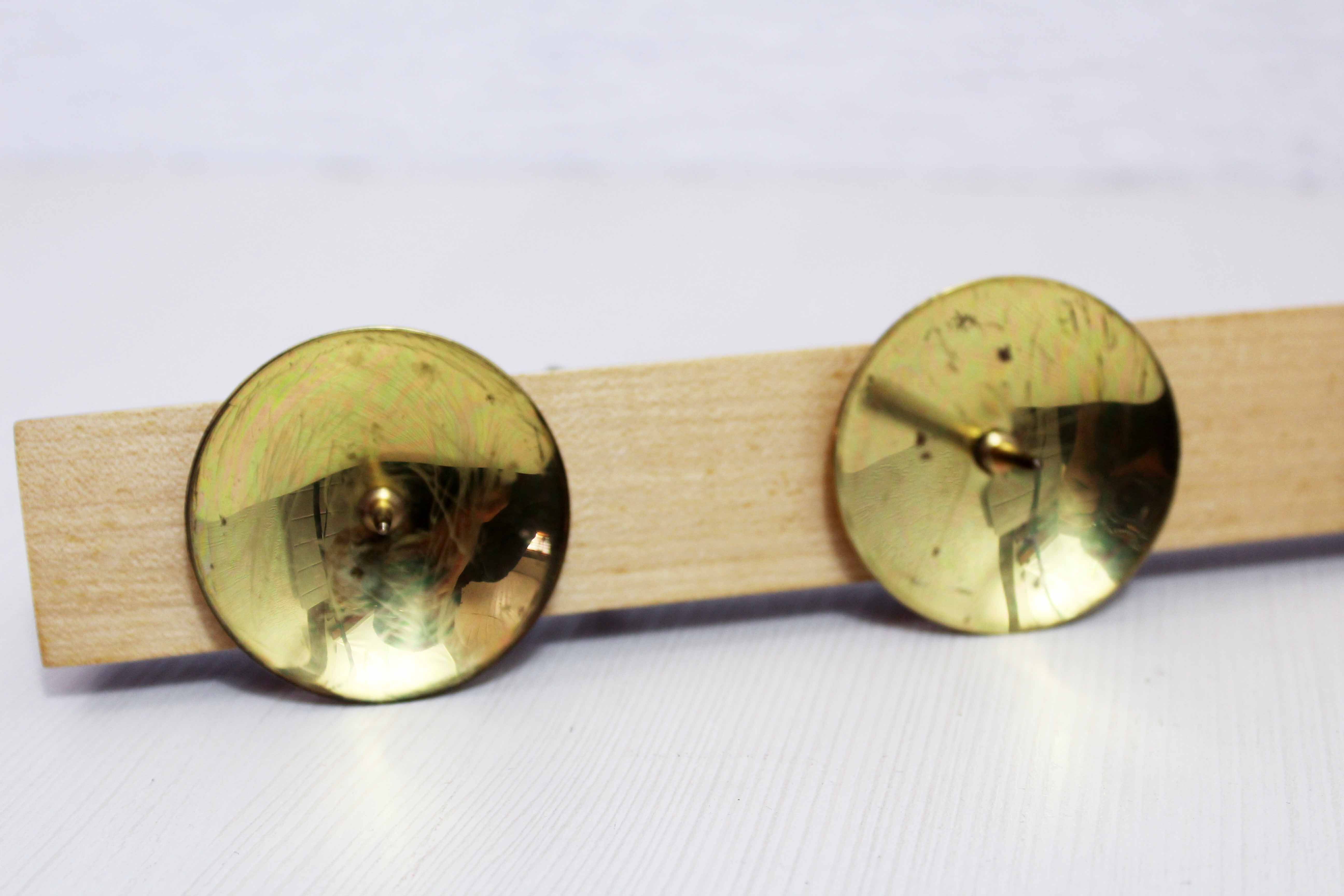 Wooden and brass candle holder