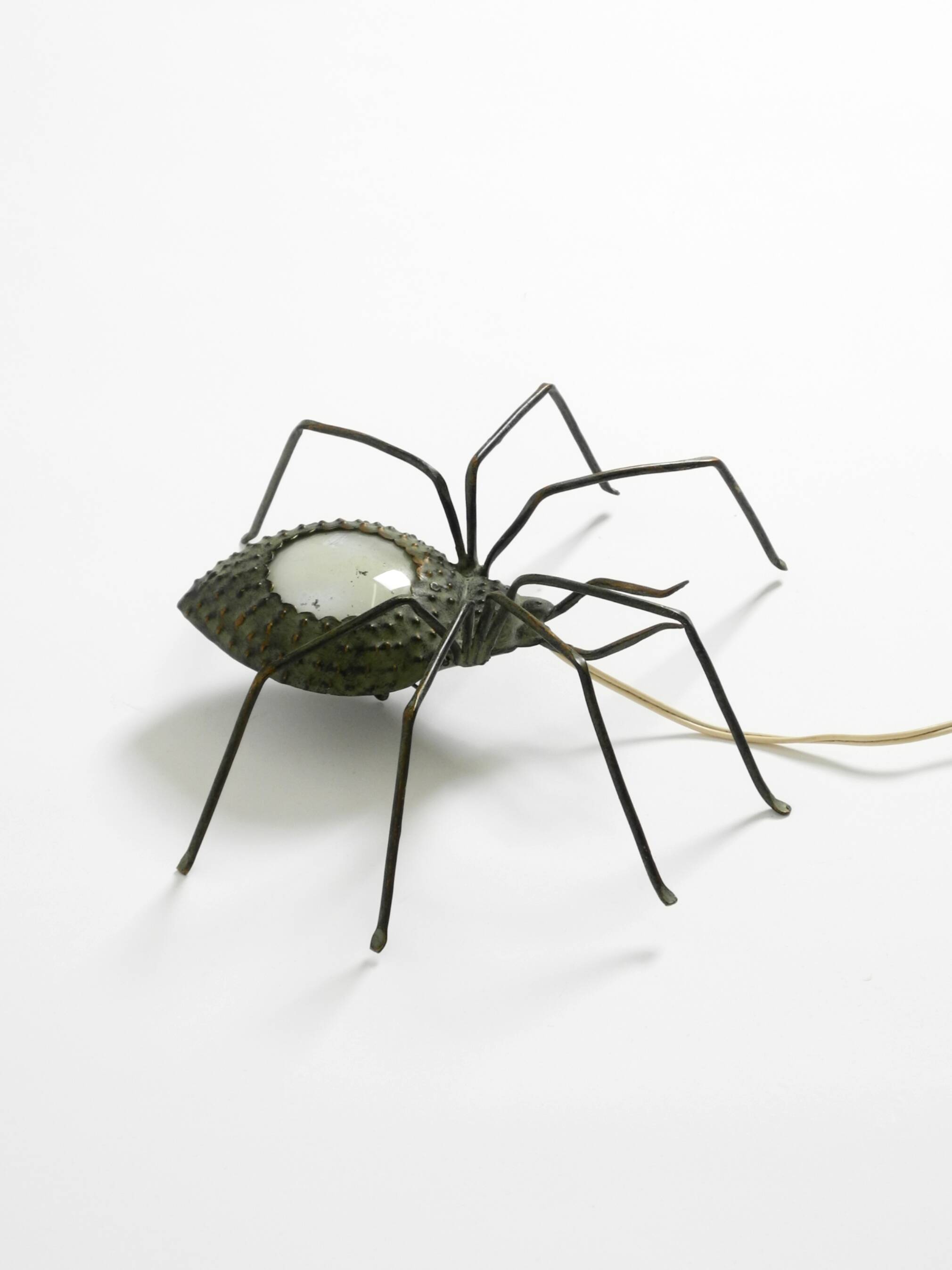 Beautiful Italian Mid Century Modern "Spider" wall lamp made of metal