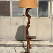 Floor lamp in solid olive wood, Brutalist style, French work from the 1970s.