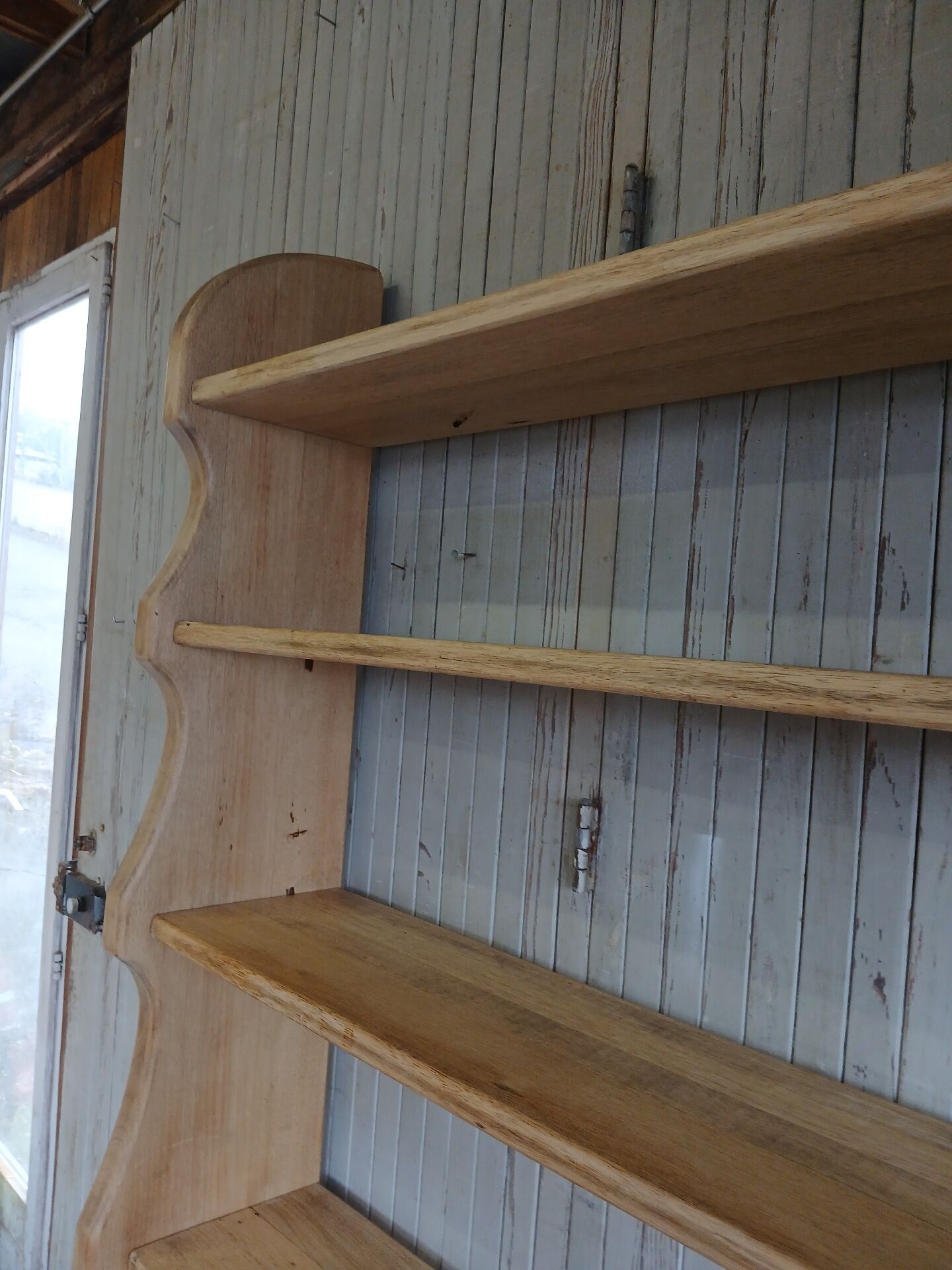 Solid wood shelf in brutalist style