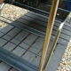 Table basse vintage double plateau verre et structure en métal doré