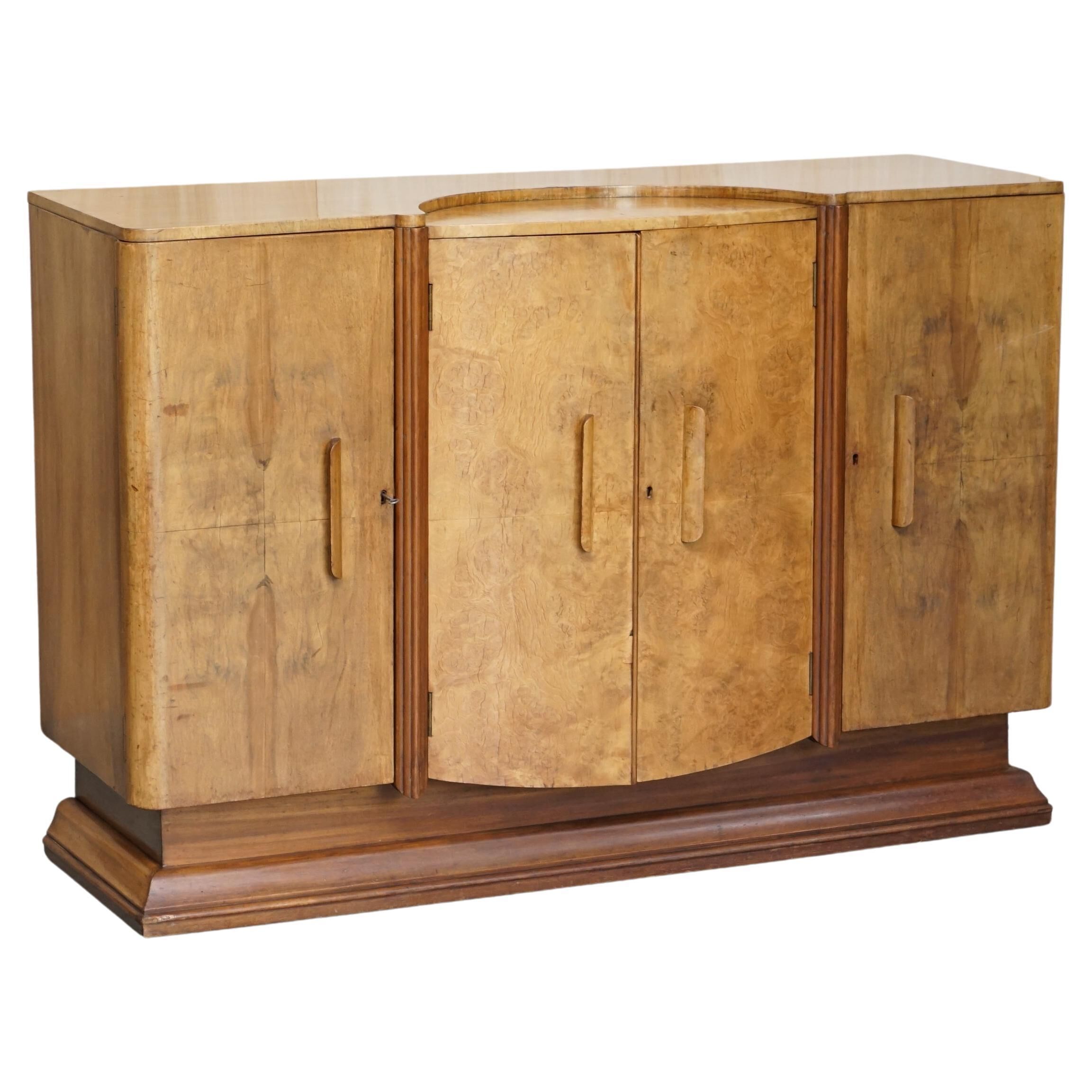 Art Deco walnut burr sideboard with drawers and bar.