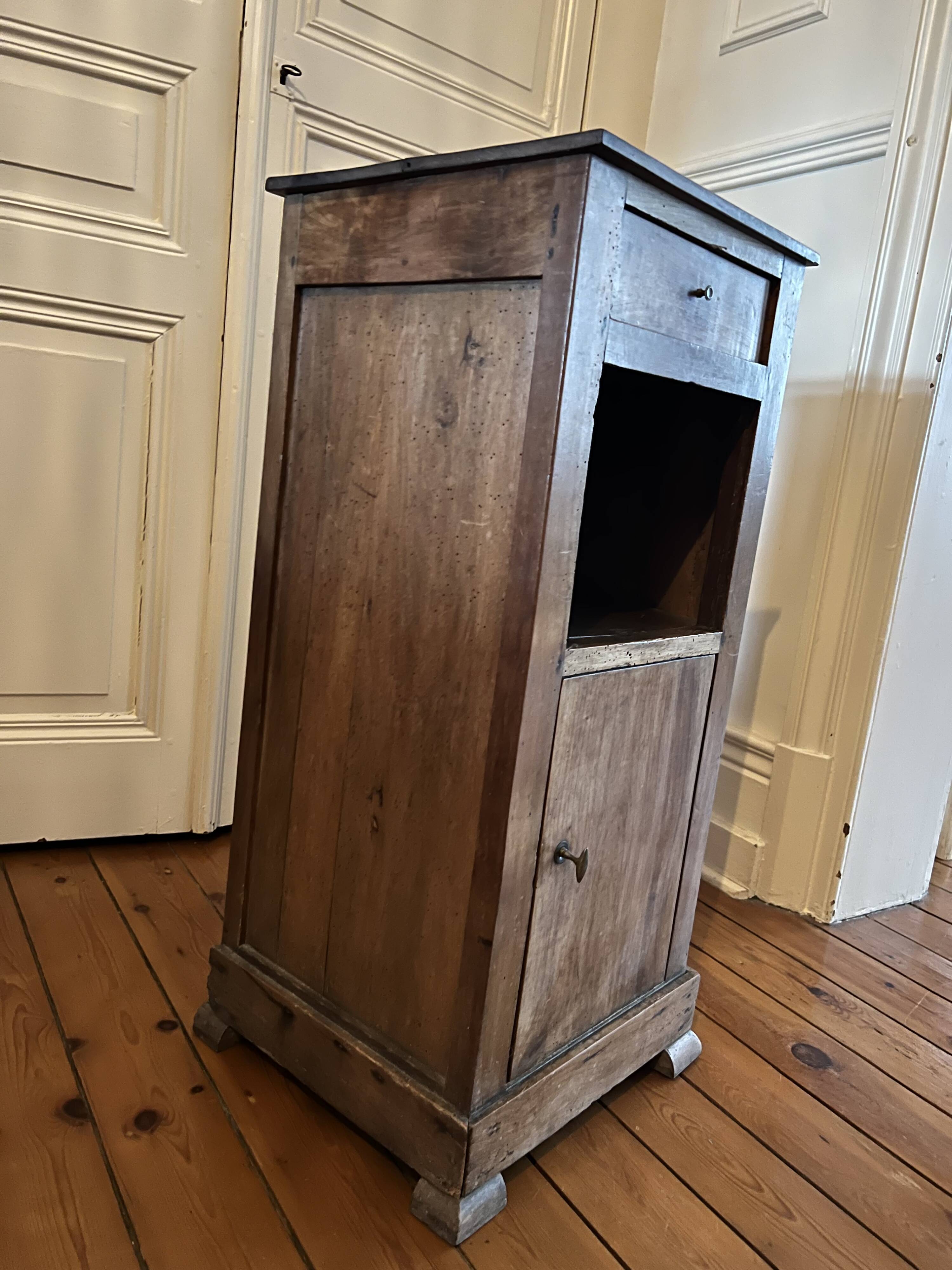 Old wooden bedside table