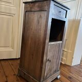 Old wooden bedside table
