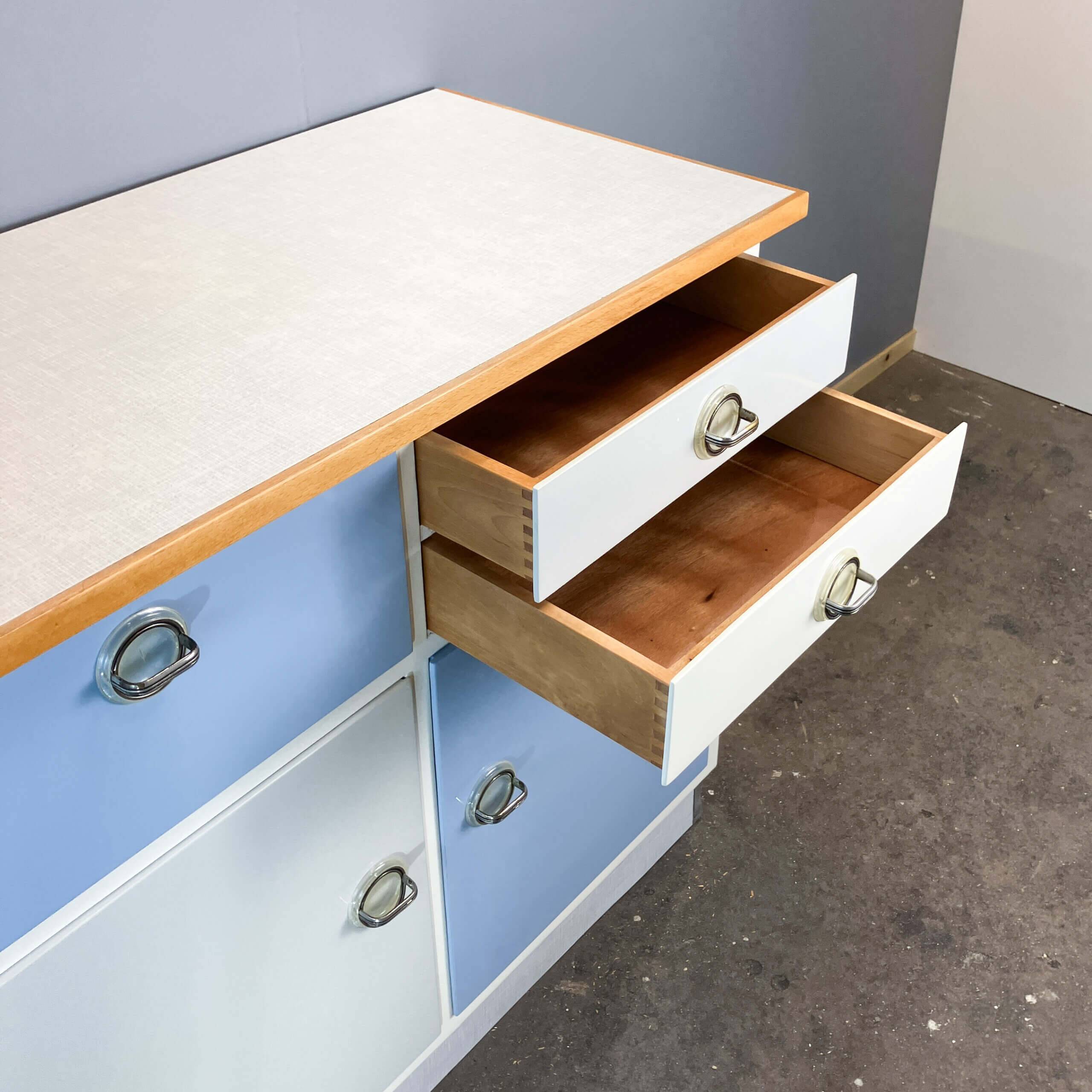 Kitchen cabinets, pastel blue and light gray, vintage from the 60s