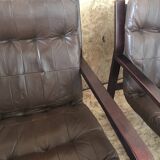 Pair of vintage armchairs in curved wood with suspended seat circa 1970-80.