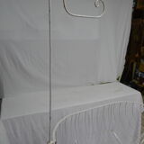 White wrought iron cradle