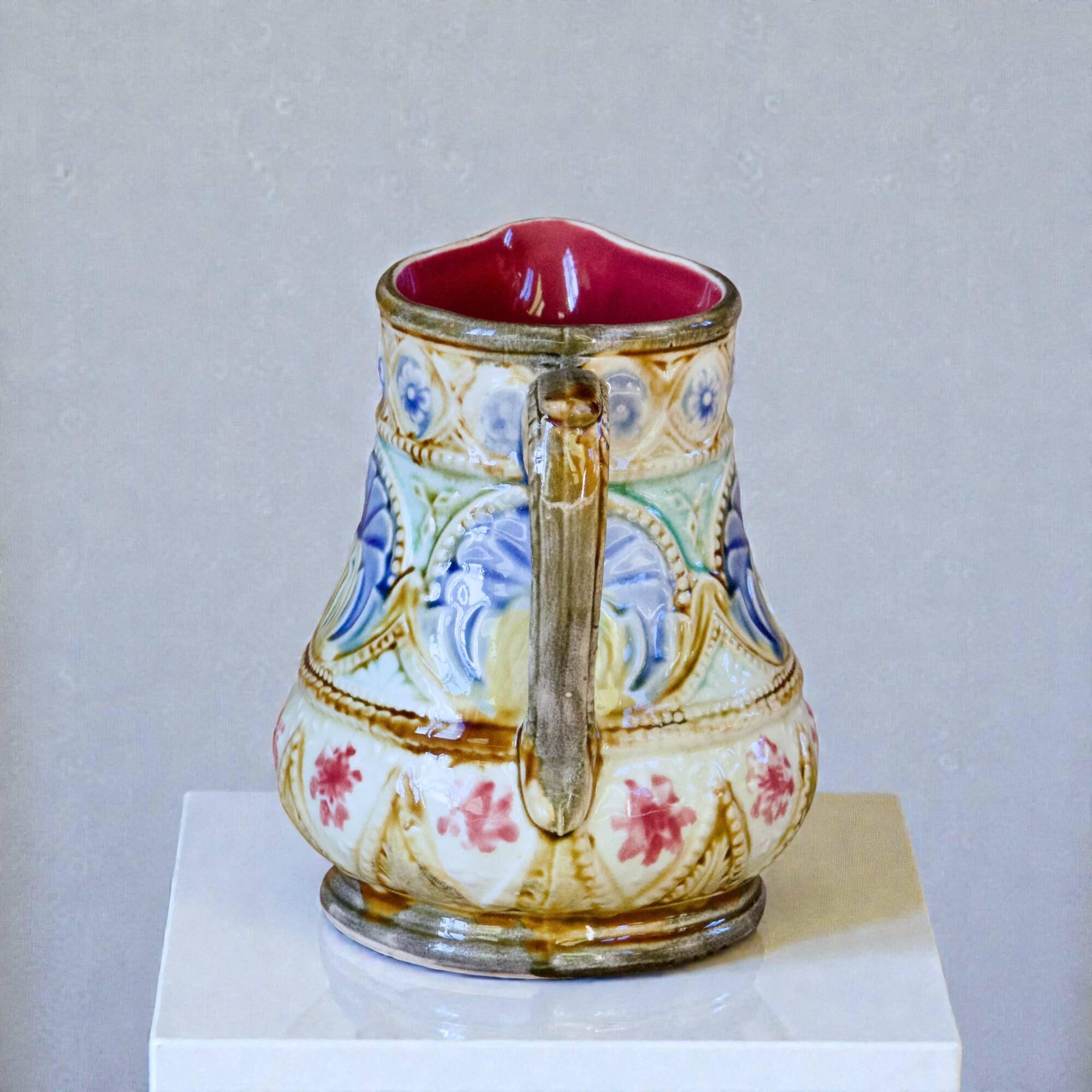 19th-century antique pitcher in polychrome majolica signed Nimy-les-Mons.