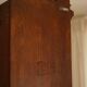 Rare high cabinet in teak by Martin Nyrop for Rud. Rasmussen, Denmark, early 20th century.