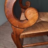 Rustic straw armchair with butts