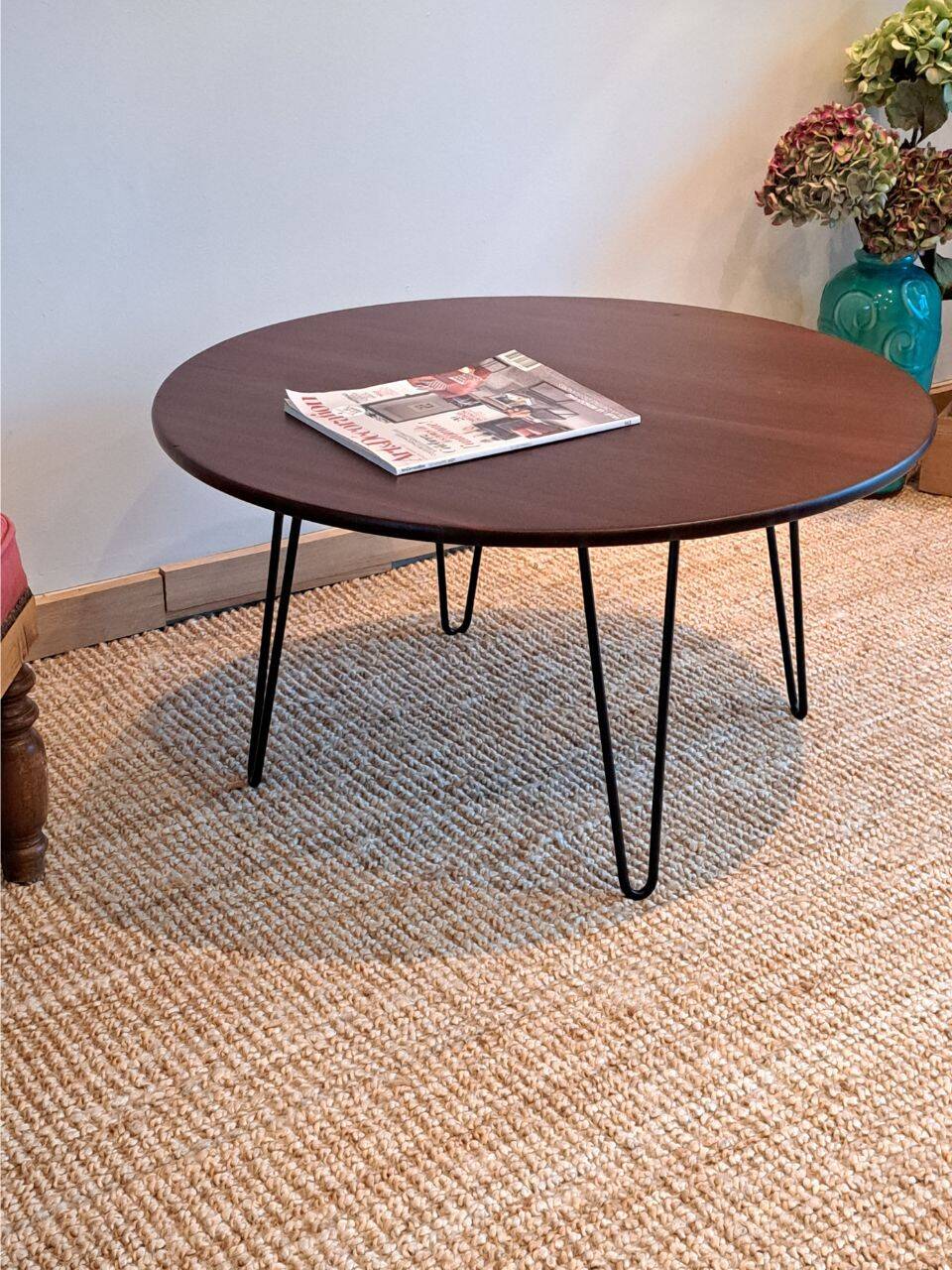 Round coffee table with mahogany wood top