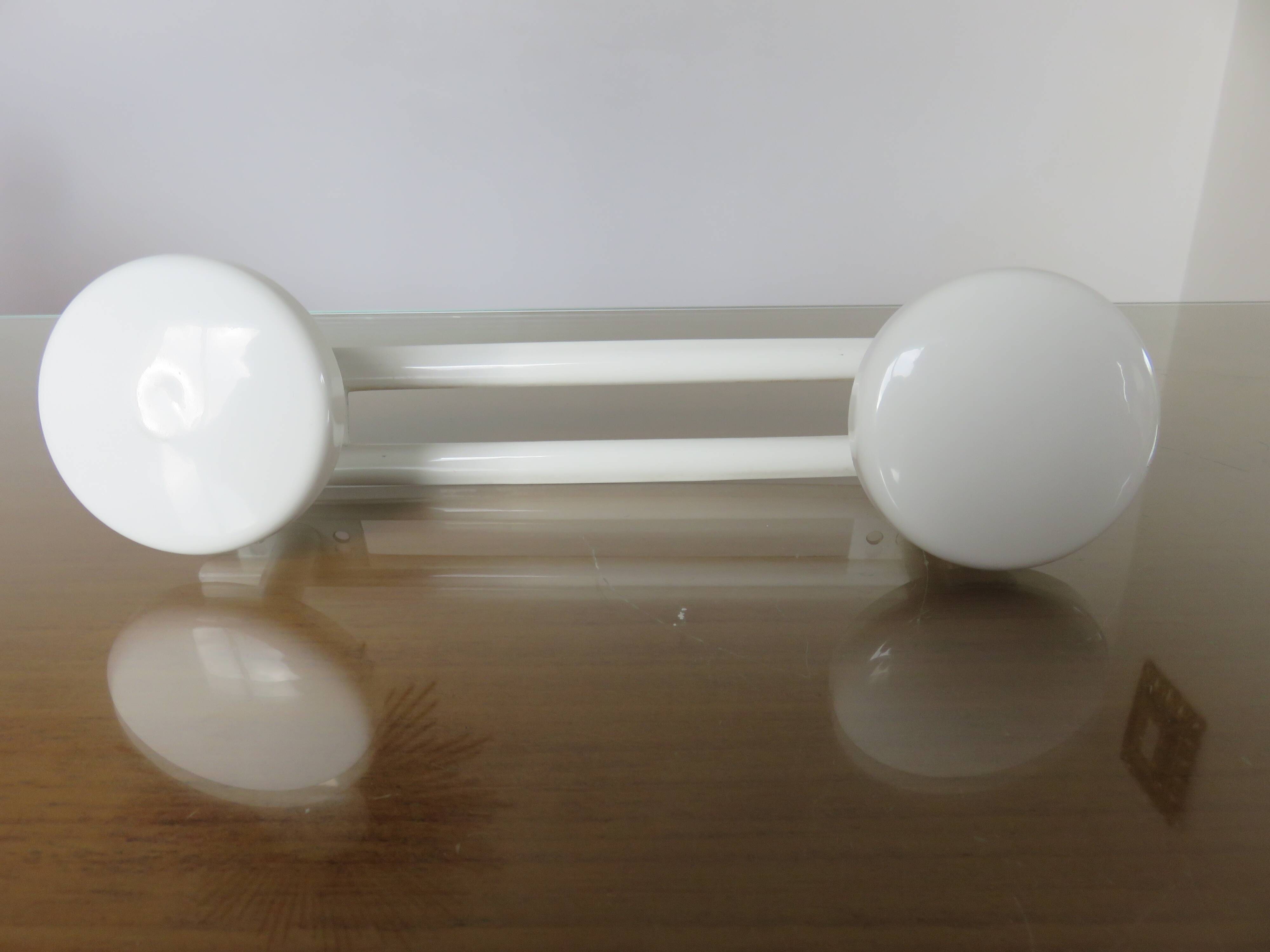 Wall coat rack in white lacquered metal with 2 hooks, 1970.