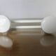 Wall coat rack in white lacquered metal with 2 hooks, 1970.