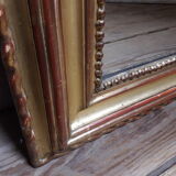 Golden mirror with pediment XIXth