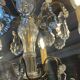 Bronze and cut crystal chandelier with 6 lights, early 20th century work.