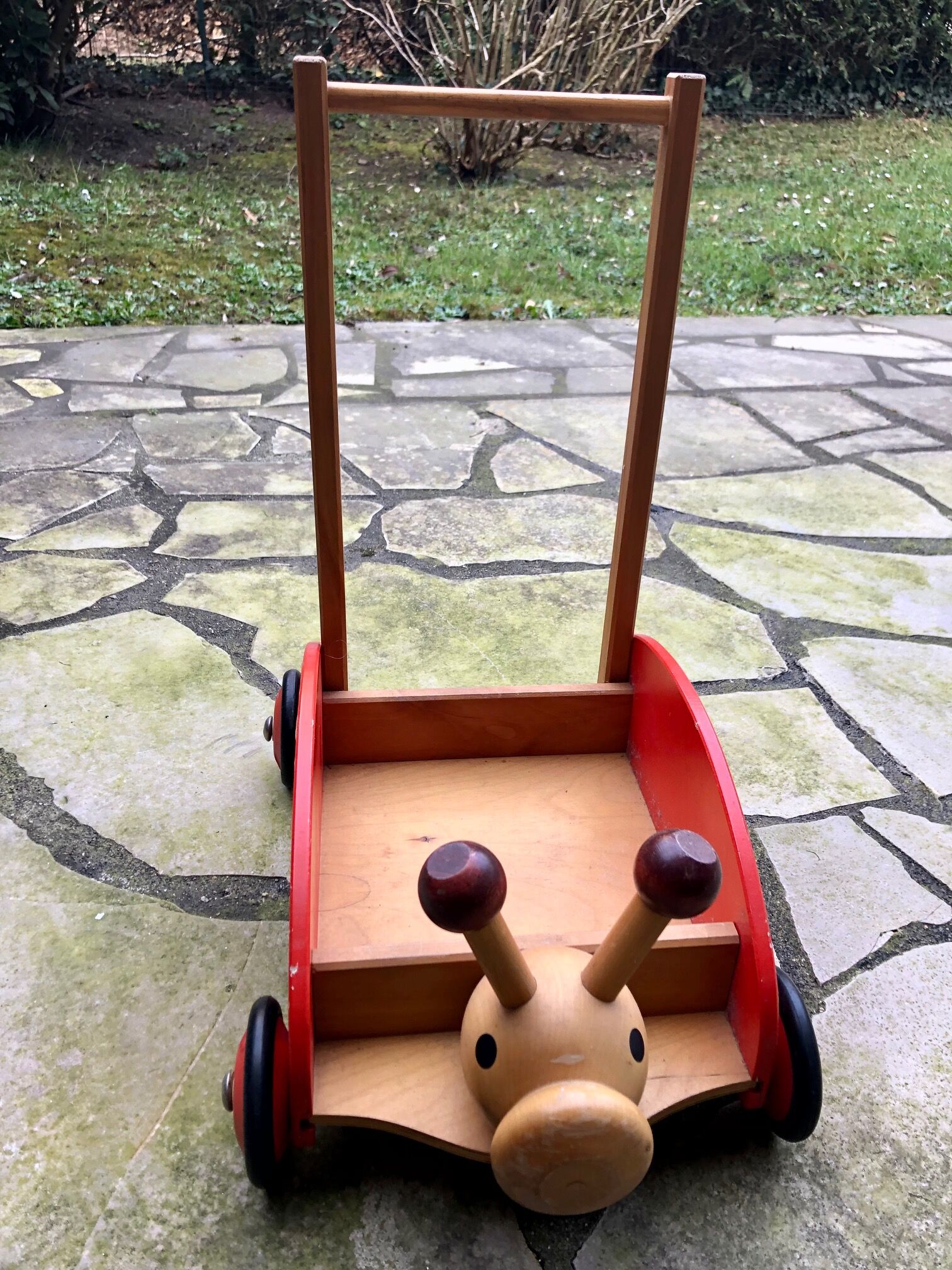 Antique toy with wheels child