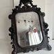Napoleon III mirror in carved blackened wood, 19th century