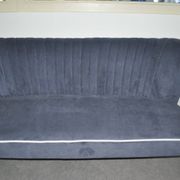 Blue fabric cocktail canapé with beech legs, 1950s style.