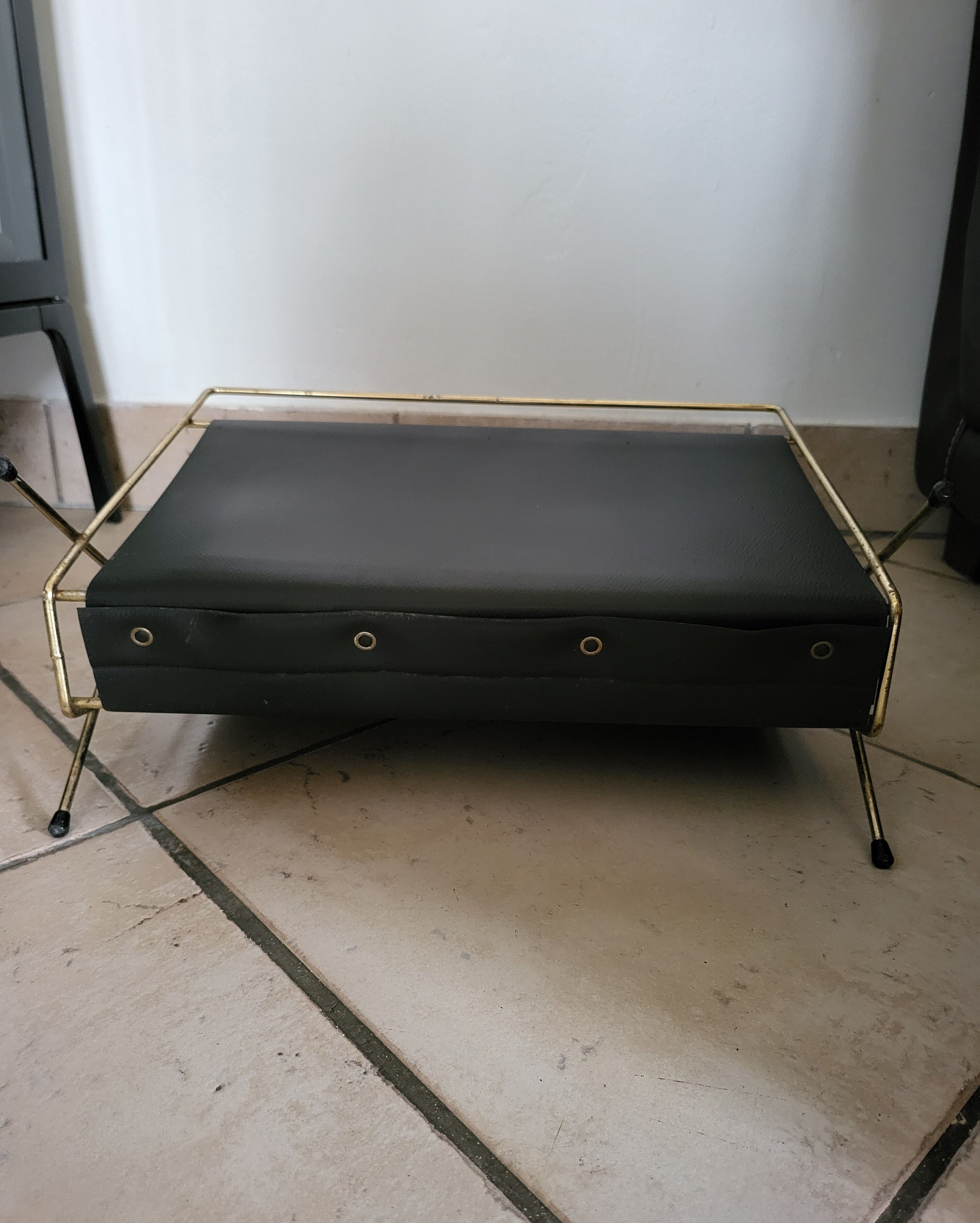 Vintage metal magazine rack in gold and black vinyl Newspaper holder