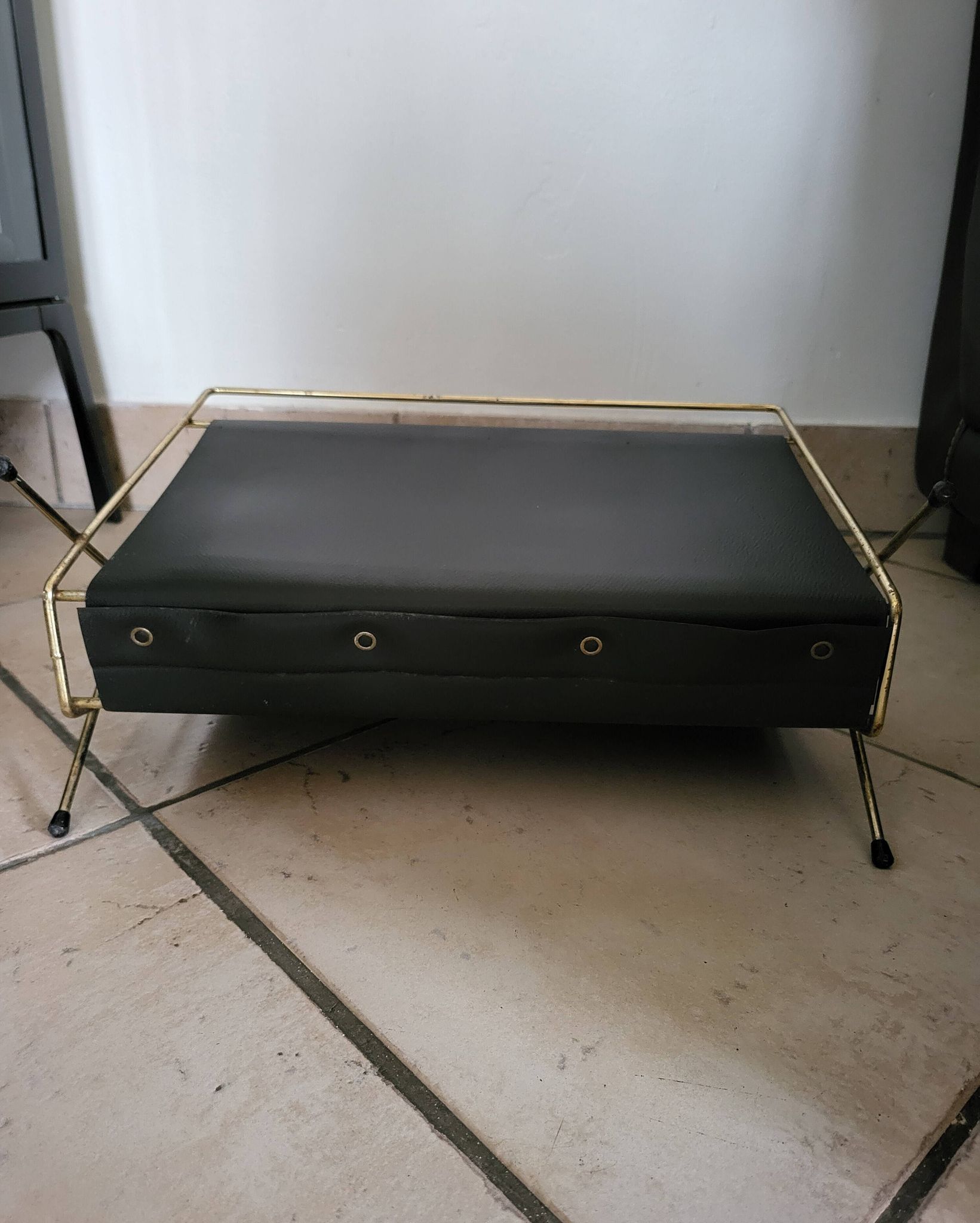 Vintage metal magazine rack in gold and black vinyl Newspaper holder