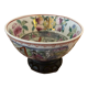 Chinese porcelain bowl on wooden base