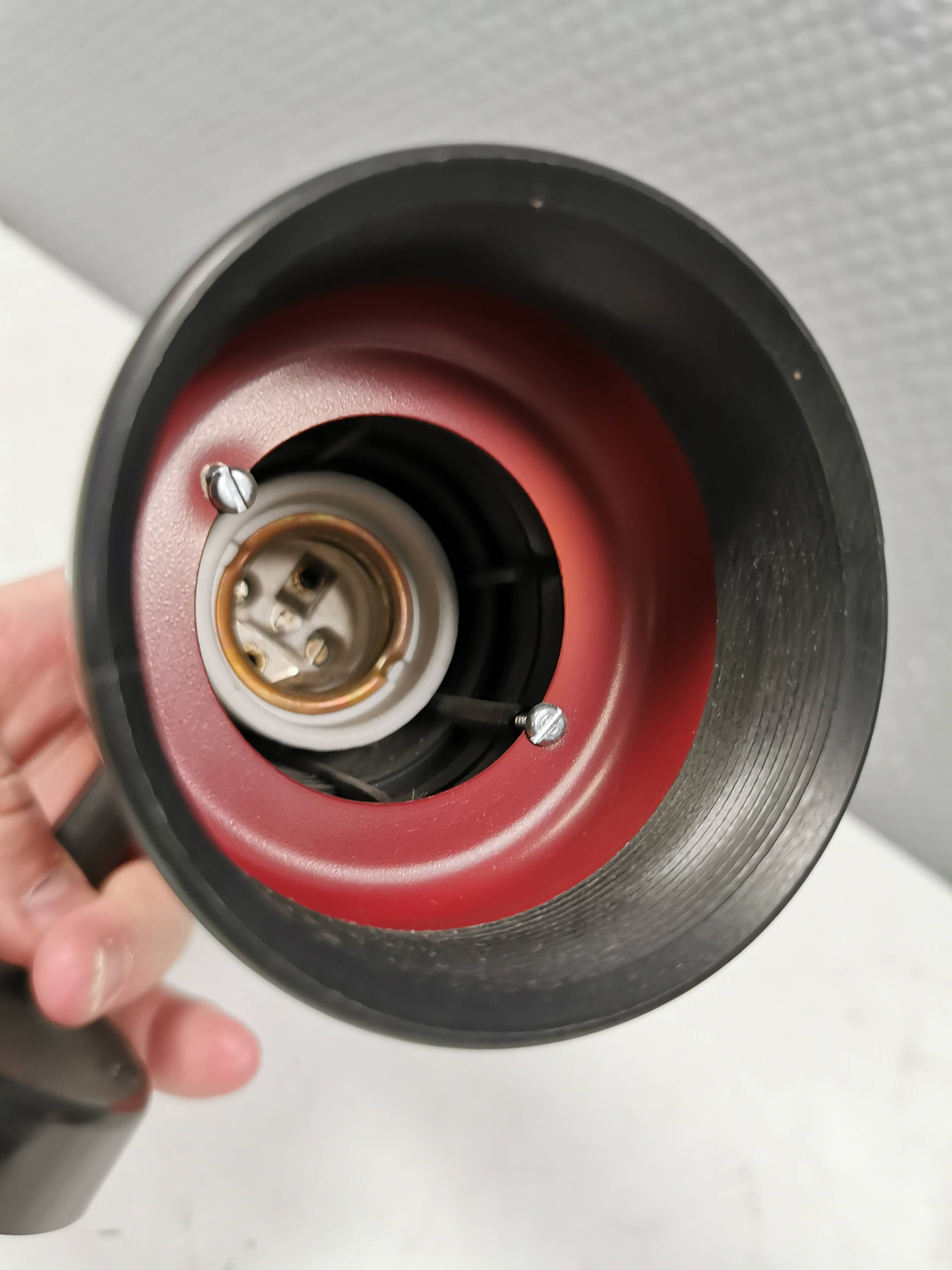 Small vintage wall lamp in hard pressed black and red plastic