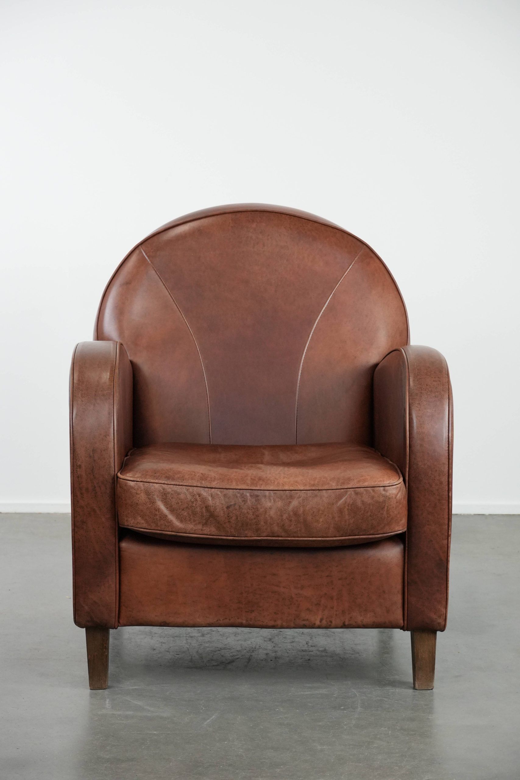 Beautiful art deco design armchair made of cowhide leather in English style