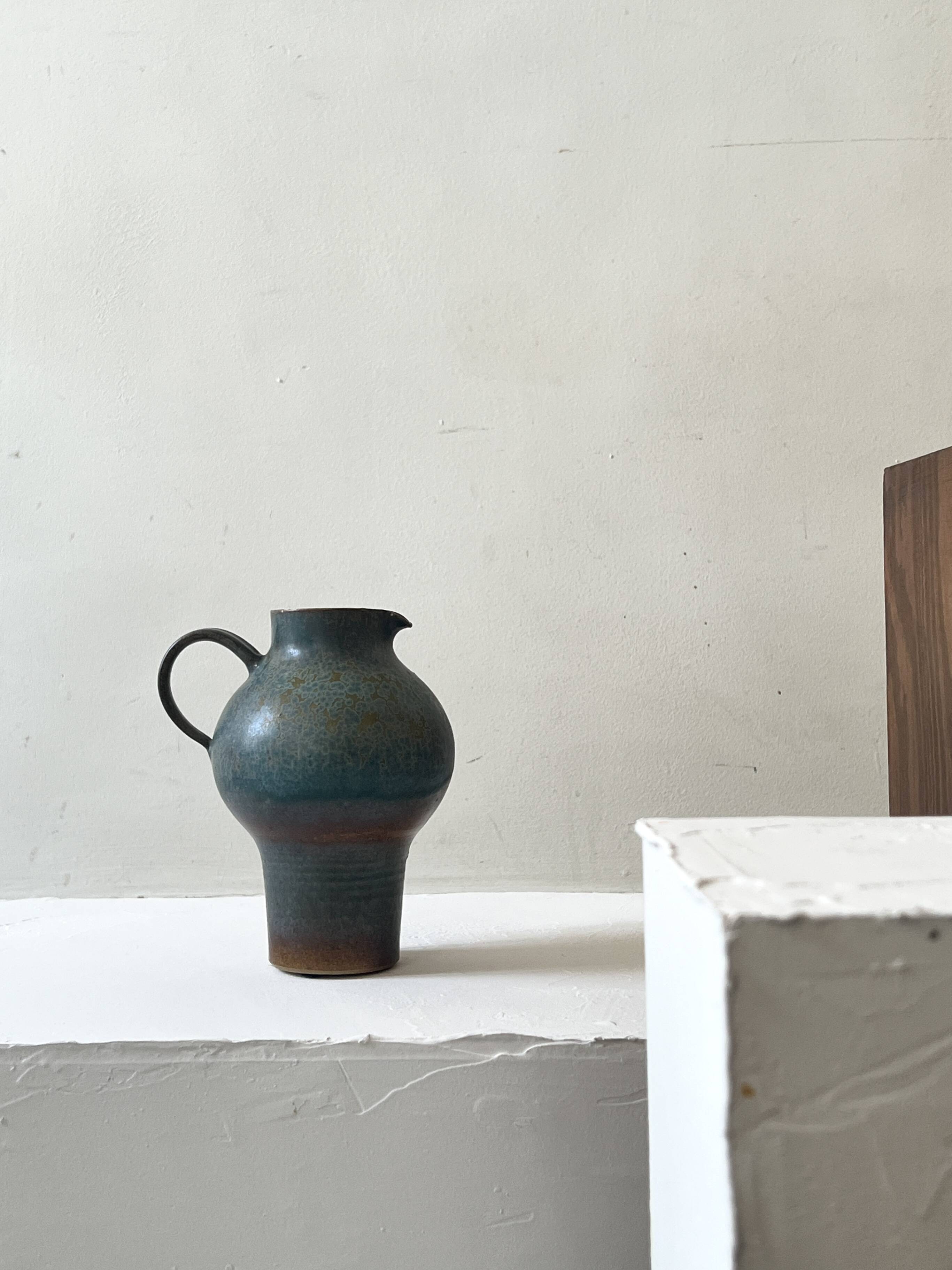 Brownish blue ceramic vase signed AH, France 1950.