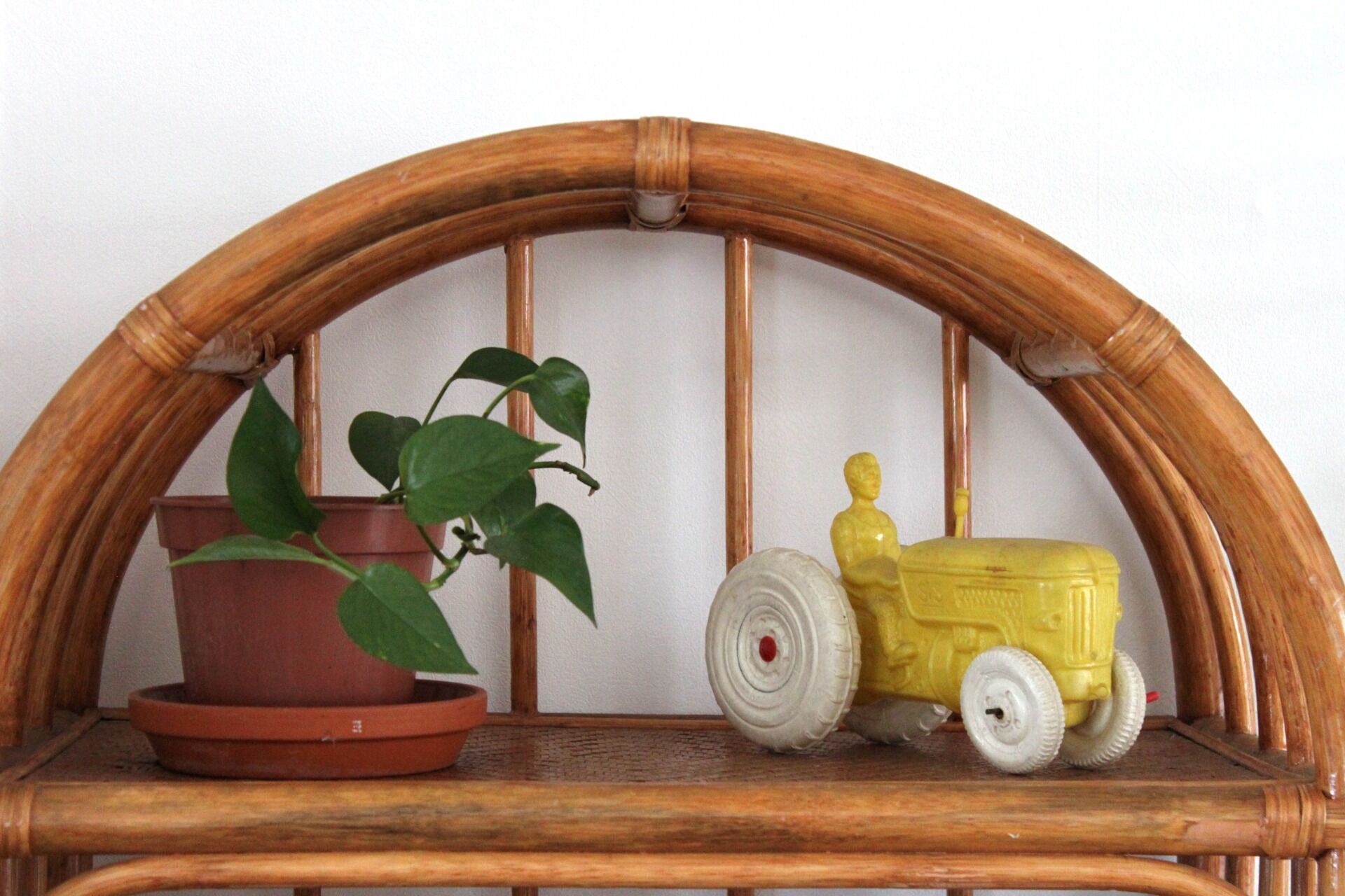 Woven rattan and bent bamboo arched bookcase display high wall cabinet.