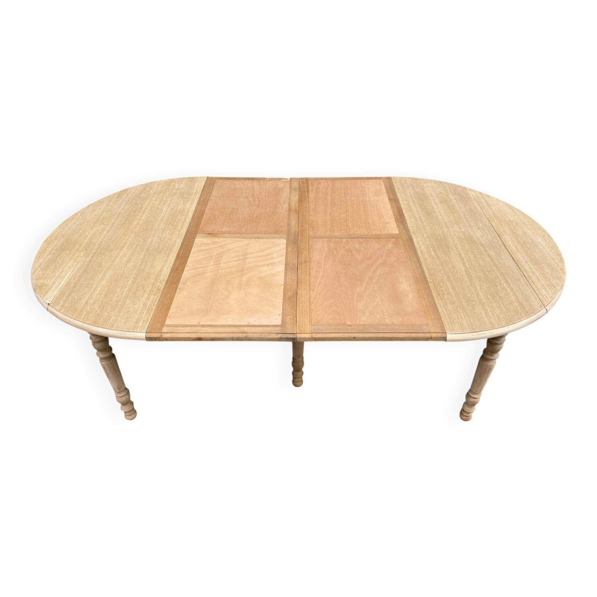 Round dining table with extendable leaves, Louis Philippe style, stripped in raw oak.
