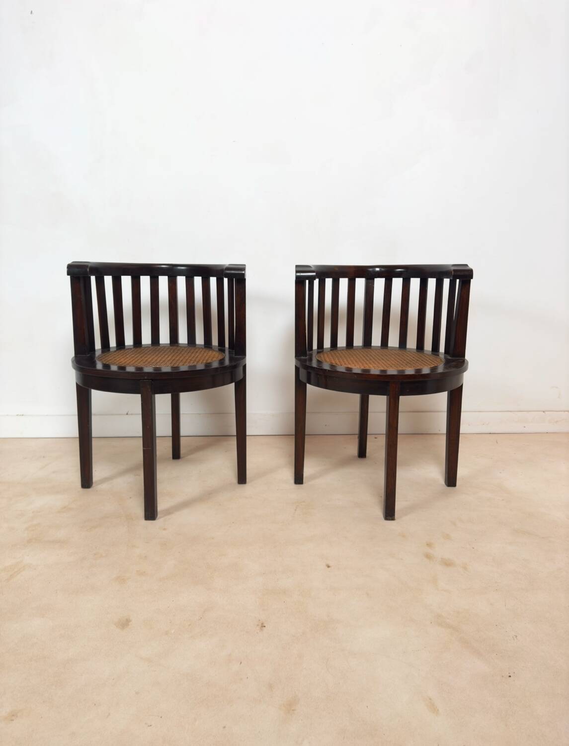 Set of 2 colonial armchairs in wood and cane.