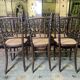 Suite de 6 chaises bistrot en cannage Fischel