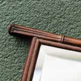 Asymmetrical beveled mirror, bamboo frame