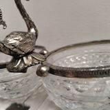 Crystal bowls joined by "swan neck" creation.