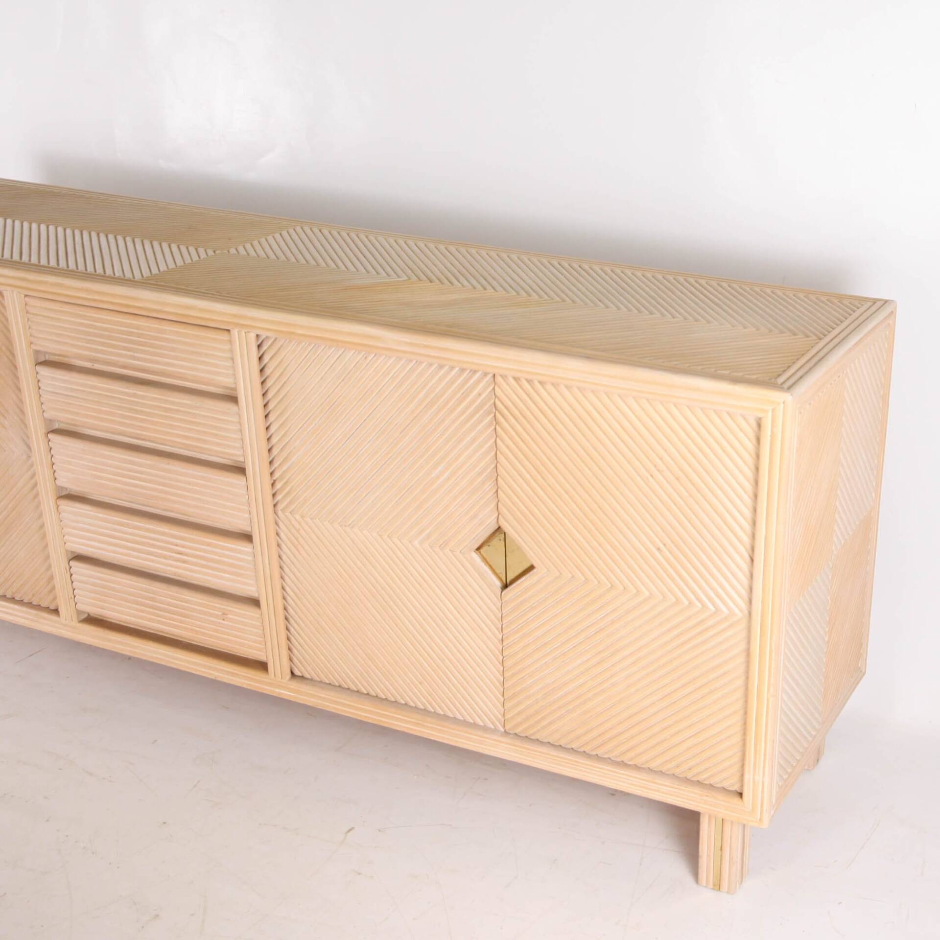Rattan and brass sideboard