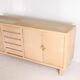 Rattan and brass sideboard