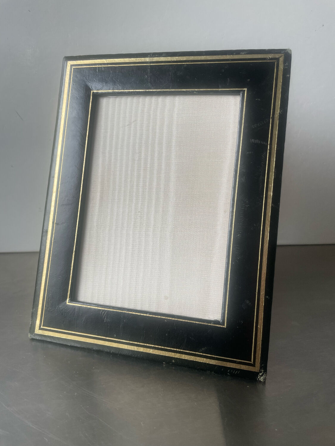 Antique black leather  with gilding frame measurements 19 cm x 15 cm