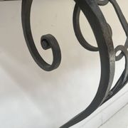 Art Deco console in hammered wrought iron, 20th century.