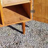Vintage golden oak sideboard with conical legs from the 1950s