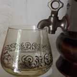 Vintage glass and wood whiskey bottle with pouring tap