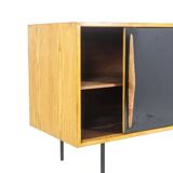 Low ash sideboard with sliding doors. 1960s.